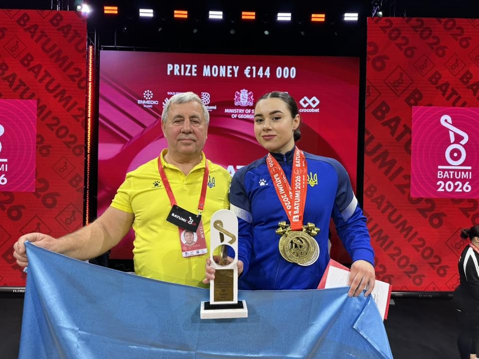 Ірина Домбровська разом з тренером